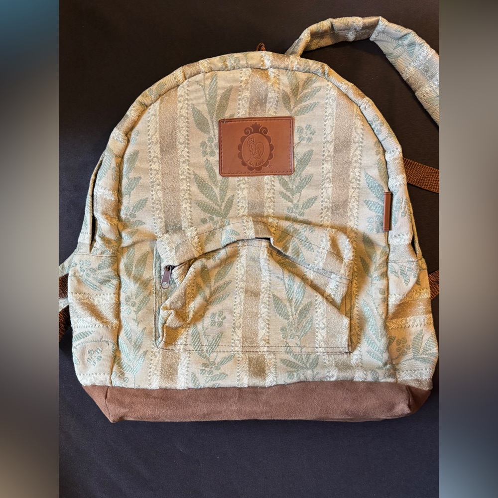 Patterned Backpack with Brown Accents